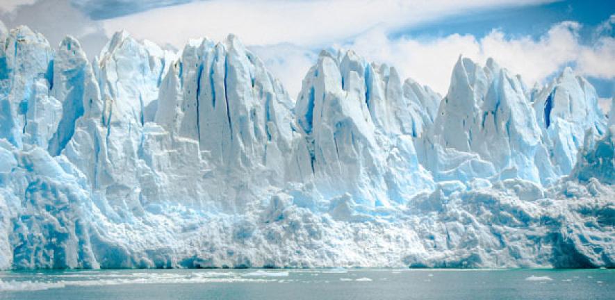 iceberg near body of water