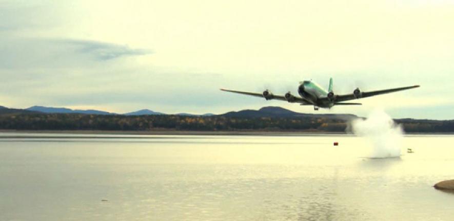 A plane drops a bouncing bomb at Mackenzie, British Columbia, where researchers successfully reconstructed the Dambusters mission of World War II. 