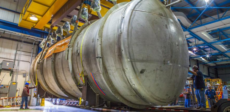 Teams prepare to move the MicroBooNE cryostat from DZero to the Liquid Argon Test Facility (LArTF).