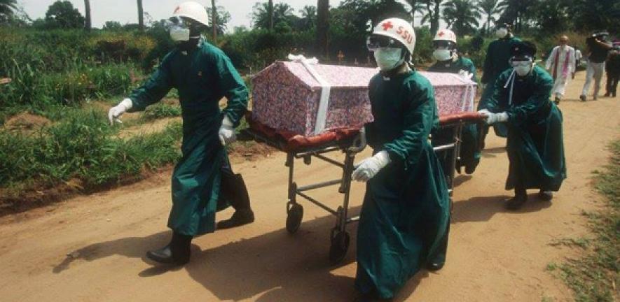 Young men of Sierra Leone bury Ebola casualties