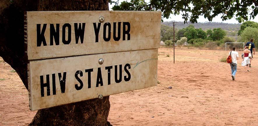 Know your HIV status sign in Simonga village, Zambia.