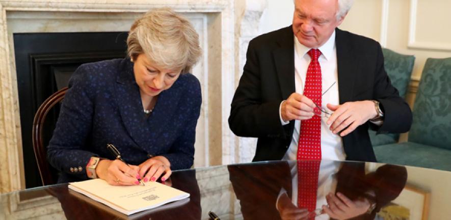 PM and Brexit Secretary sign commemorative copies of EU (Withdrawal) Act.