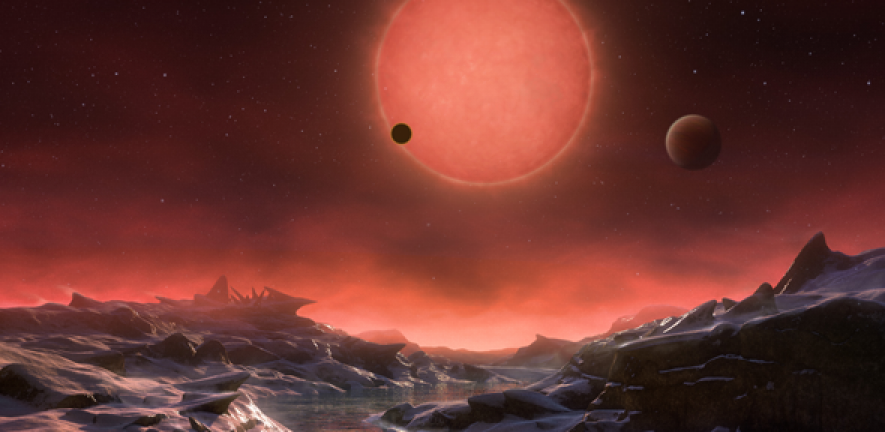 Artist’s impression of the ultracool dwarf star TRAPPIST-1 from the surface of one of its planets. 