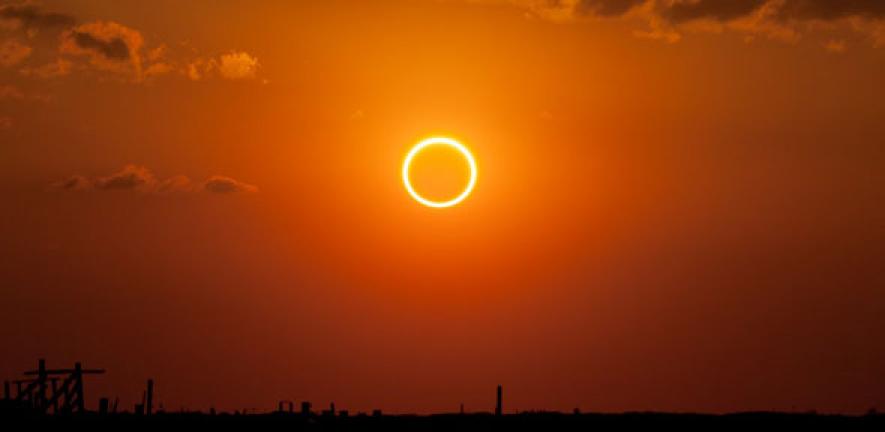 Annular eclipse photographed at sunset in eastern New Mexico.