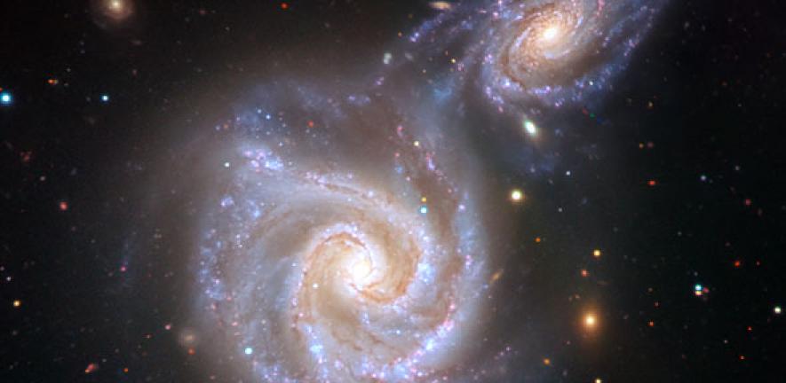 Artist's impression of a collision between the Milky Way and a massive dwarf