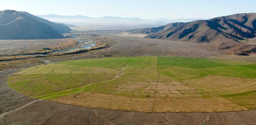 Vast pivot irrigator shows farming encroaching on wilderness in New Zealand.  