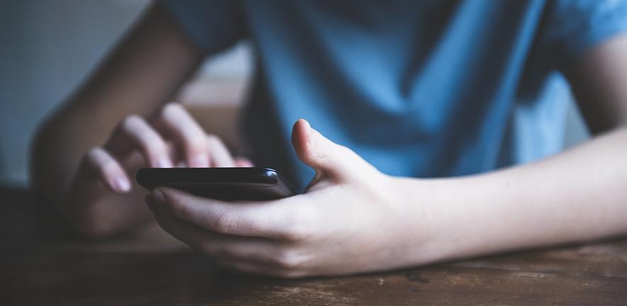 Boy using a smartphone