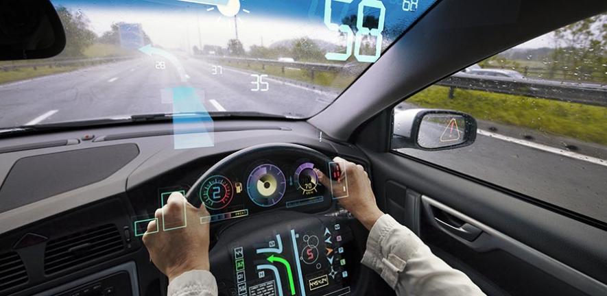 Head up display of traffic information and weather as seen by the driver