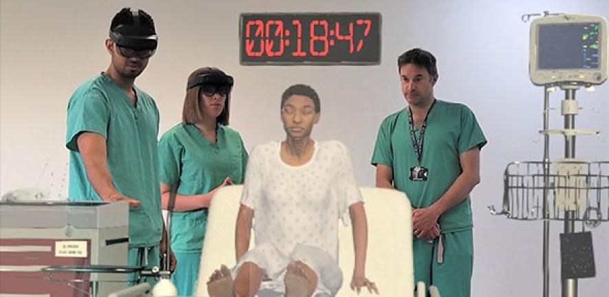 Clinicians at Addenbrooke's Hospital, Cambridge, using HoloScenarios, a new training application based on life-like holographic patient scenarios