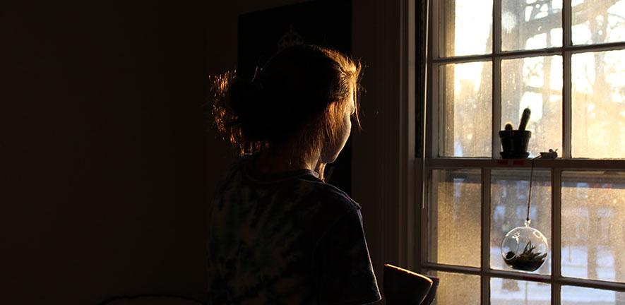  A girl looking out of a window