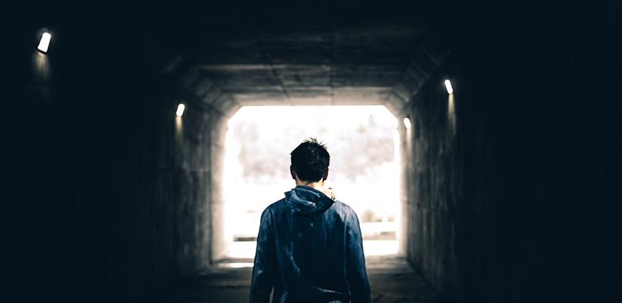 Man standing in a subway