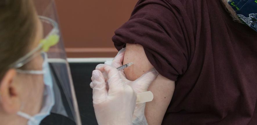 Patient receiving a COVID-19 vaccination