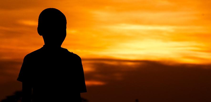 Boy at sunset