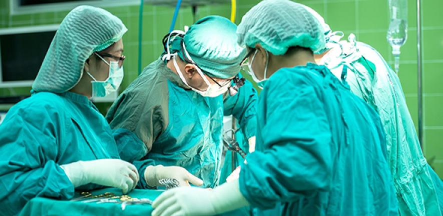 Surgeons at work in an operating theatre