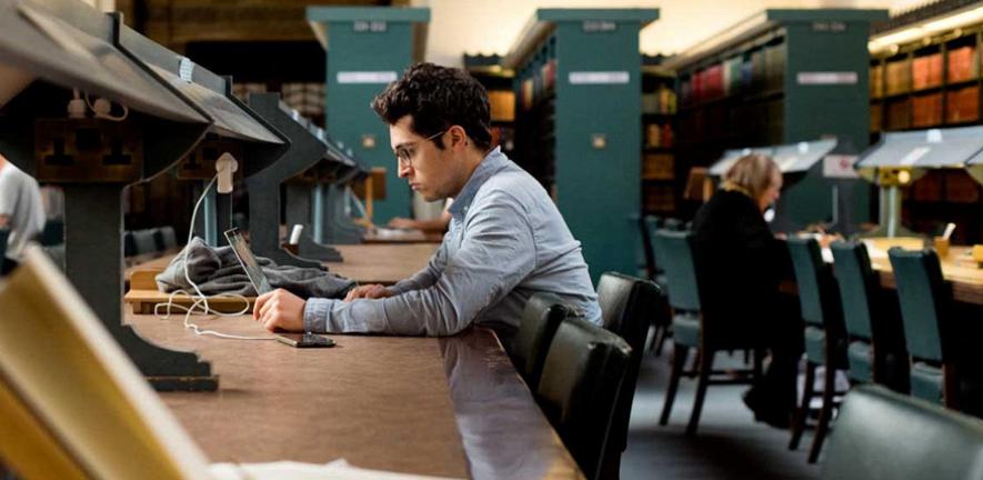 Student in Cambridge University Library
