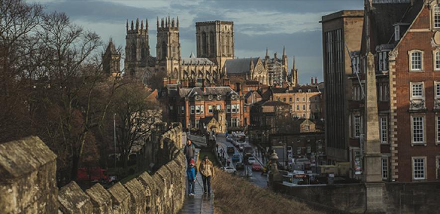 View of the city of York in England including walls and cathedral