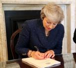 PM and Brexit Secretary sign commemorative copies of EU (Withdrawal) Act.