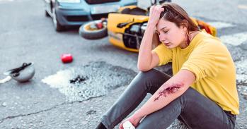 Female Still In Shock After Getting Hit By Car With Motorcycle