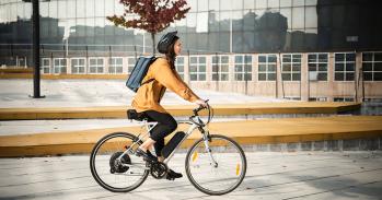 Businesswoman on electric bike