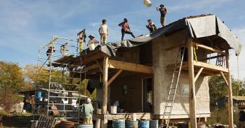 People installing a living roof in 2012