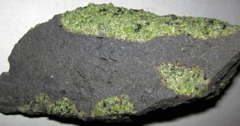 Chunks of exotic green rocks from the mantle erupted from the San Carlos Volcanic Field, Arizona