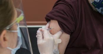 Patient receiving a COVID-19 vaccination