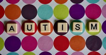 Tiles spelling "autism"