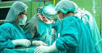 Surgeons at work in an operating theatre