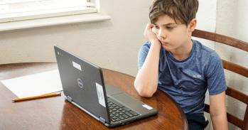 Boy taking part in a virtual lesson