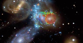 Blue, green and red colours, according to velocities derived from the WEAVE spectra, are overlaid on a composite image of Stephan’s Quintet. 