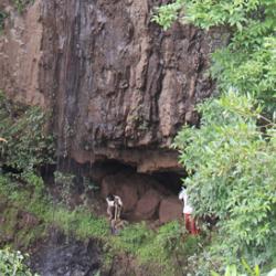Archaeologists outside the entrance to the Mota cave in the Ethiopian highlands, where the remains containing the ancient genome were discovered. 