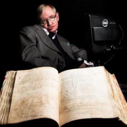 Priceless treasures: in a shot commissioned to celebrate Cambridge University Library’s 600th anniversary, Professor Stephen Hawking is pictured with Newton’s annotated first edition of Principia Mathematica.