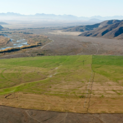 Vast pivot irrigator shows farming encroaching on wilderness in New Zealand.  