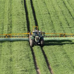 Wheat crops being sprayed with fertiliser
