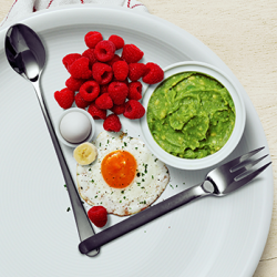 Intermittent fasting conceptual image, showing a plate of food to represent a clock.