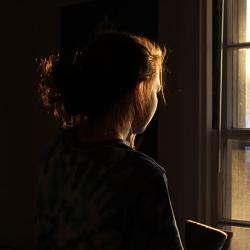  A girl looking out of a window