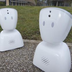 The two student avatars pictured outside the Wellcome Genome Campus