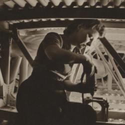 Woman working on wing section, Boeing Aircraft Company.